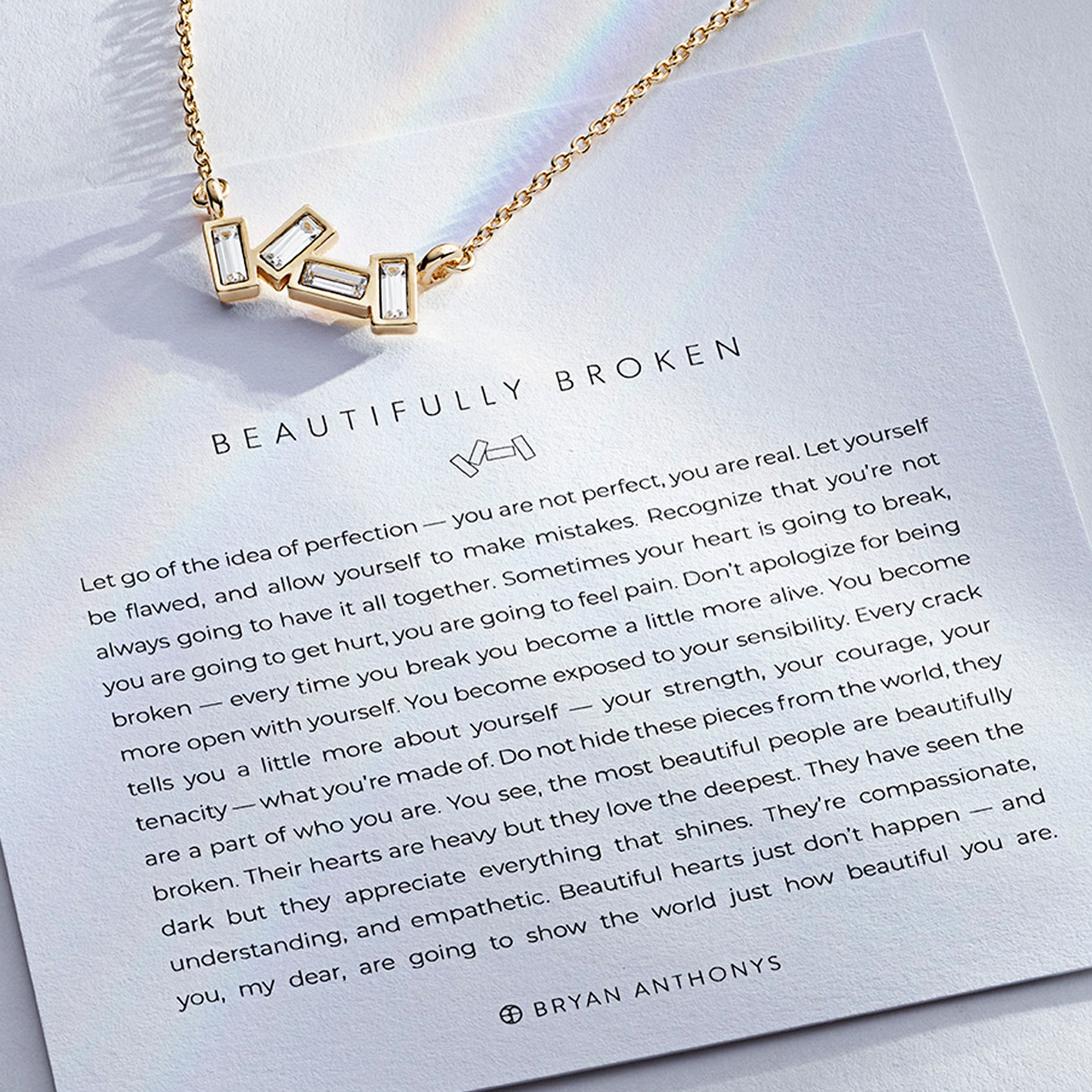 Beautifully Broken Necklace showcase in 14k gold on card
