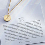 Faith Over Fear Necklace showcase in 14k gold on card
