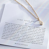 Find Your Fire Necklace in 14k gold on card