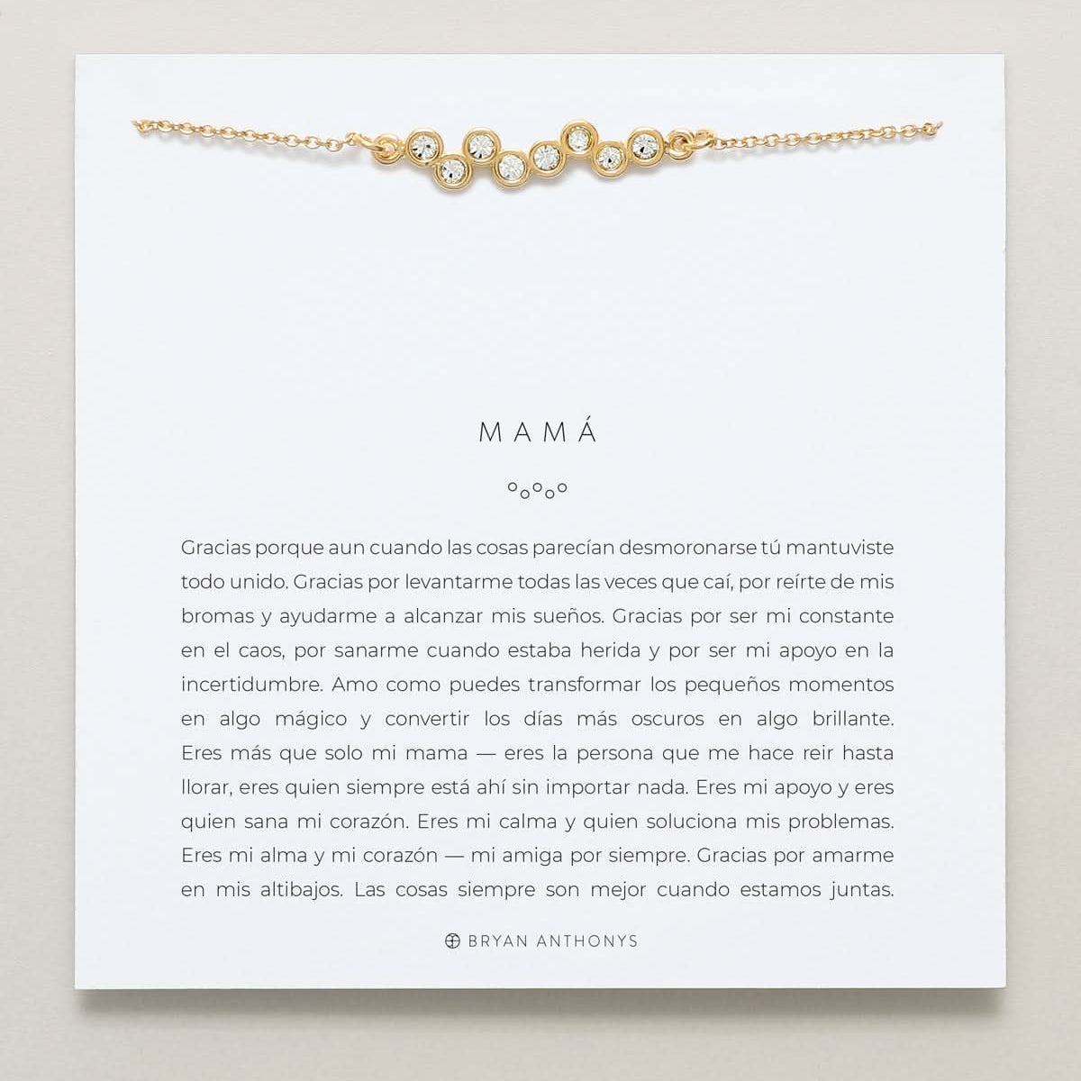 Mamá Necklace (Spanish) on card