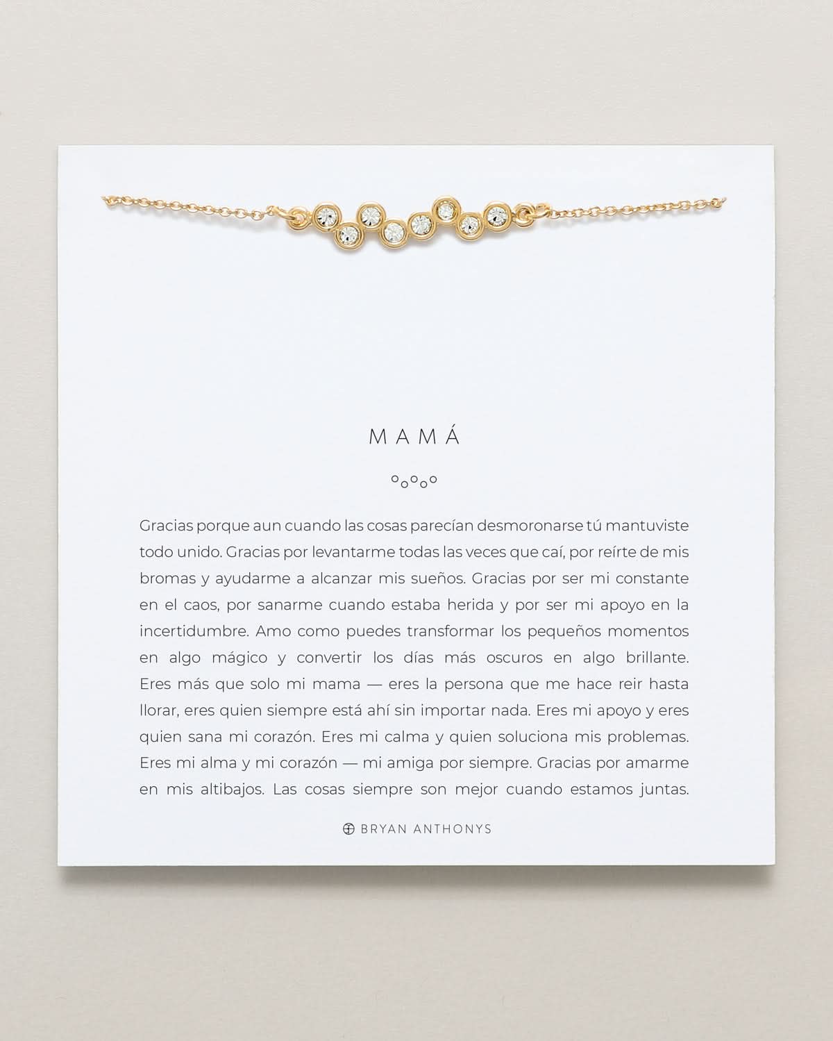 Mamá Necklace (Spanish) on card