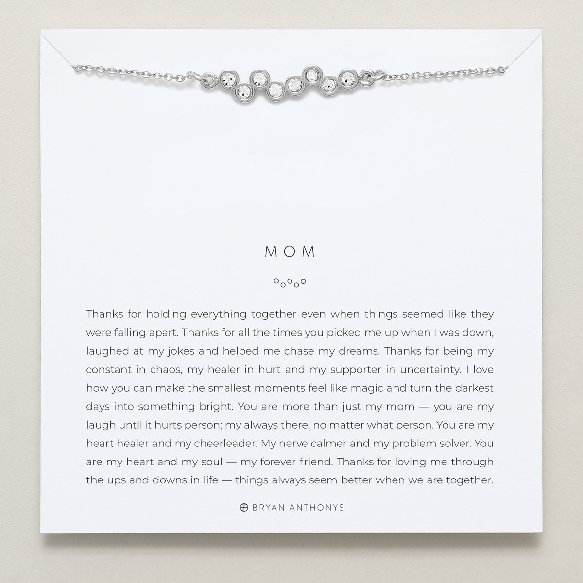 Model wearing Mom Necklace in silver finish