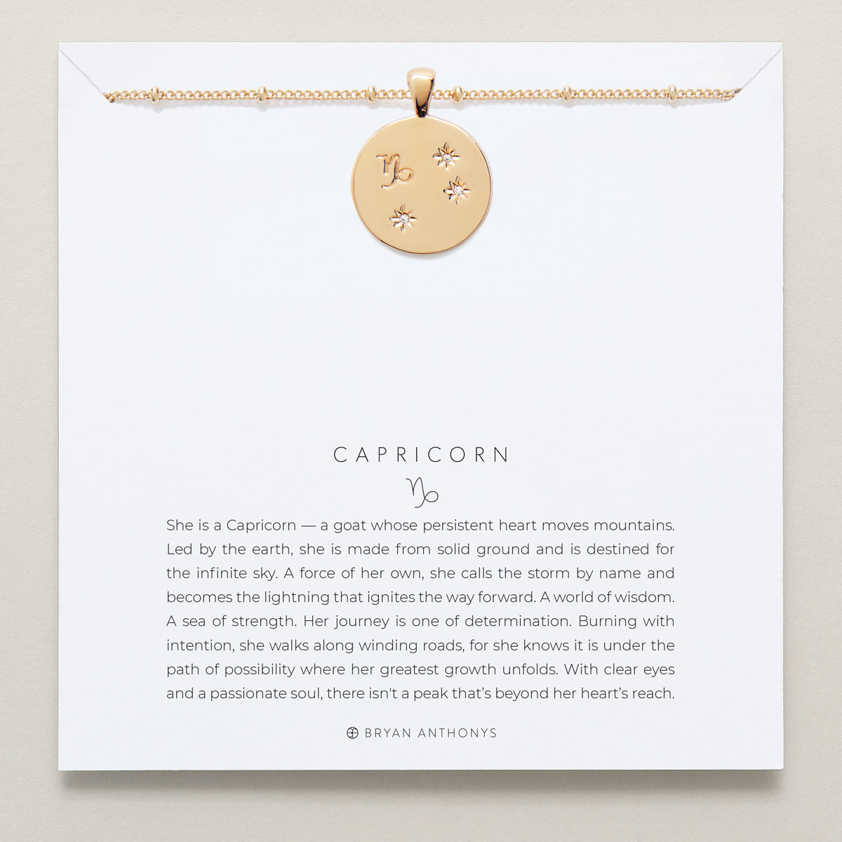 Bryan Anthonys Gold Capricorn Zodiac Necklace On Card