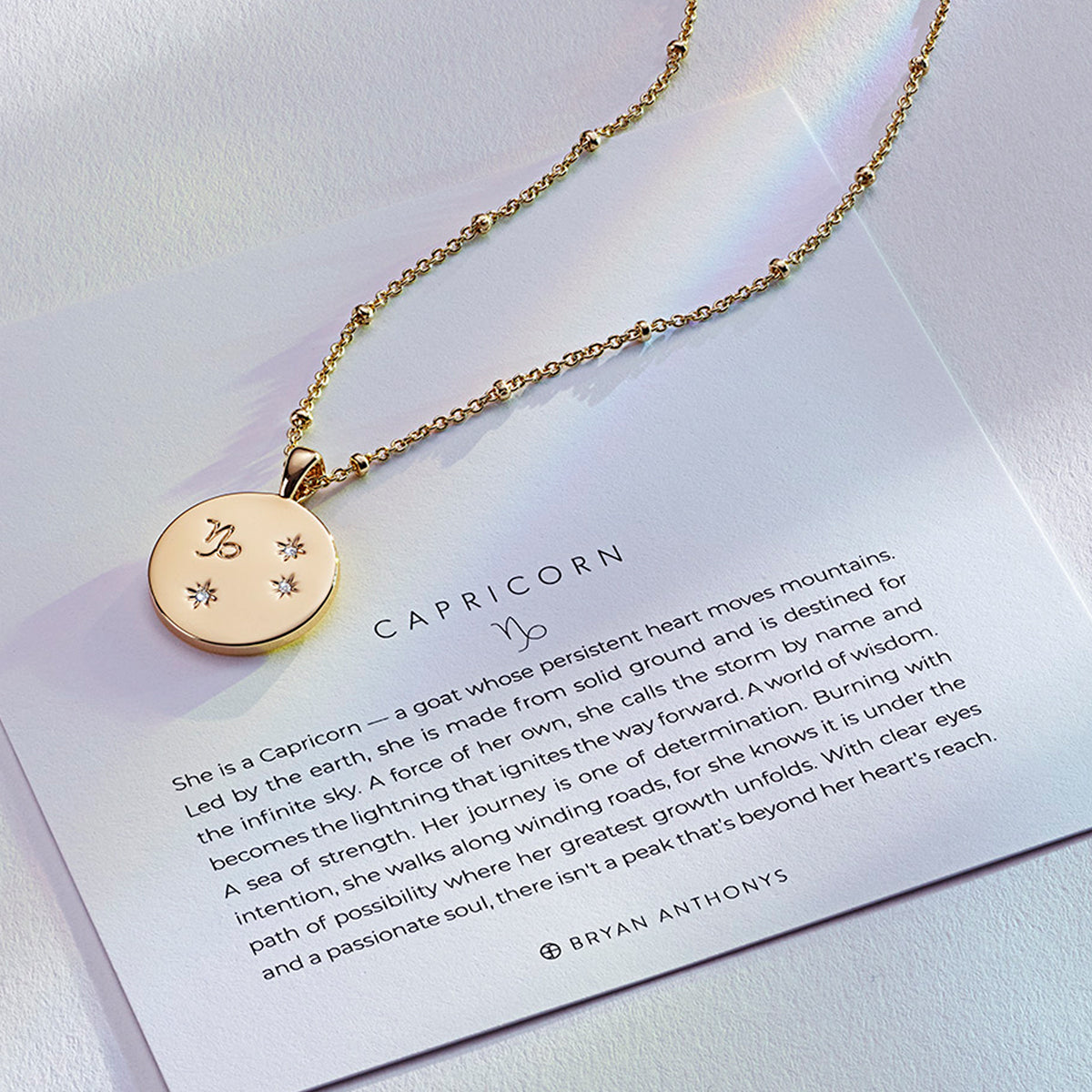 Bryan Anthonys Gold Capricorn Zodiac Necklace On Card