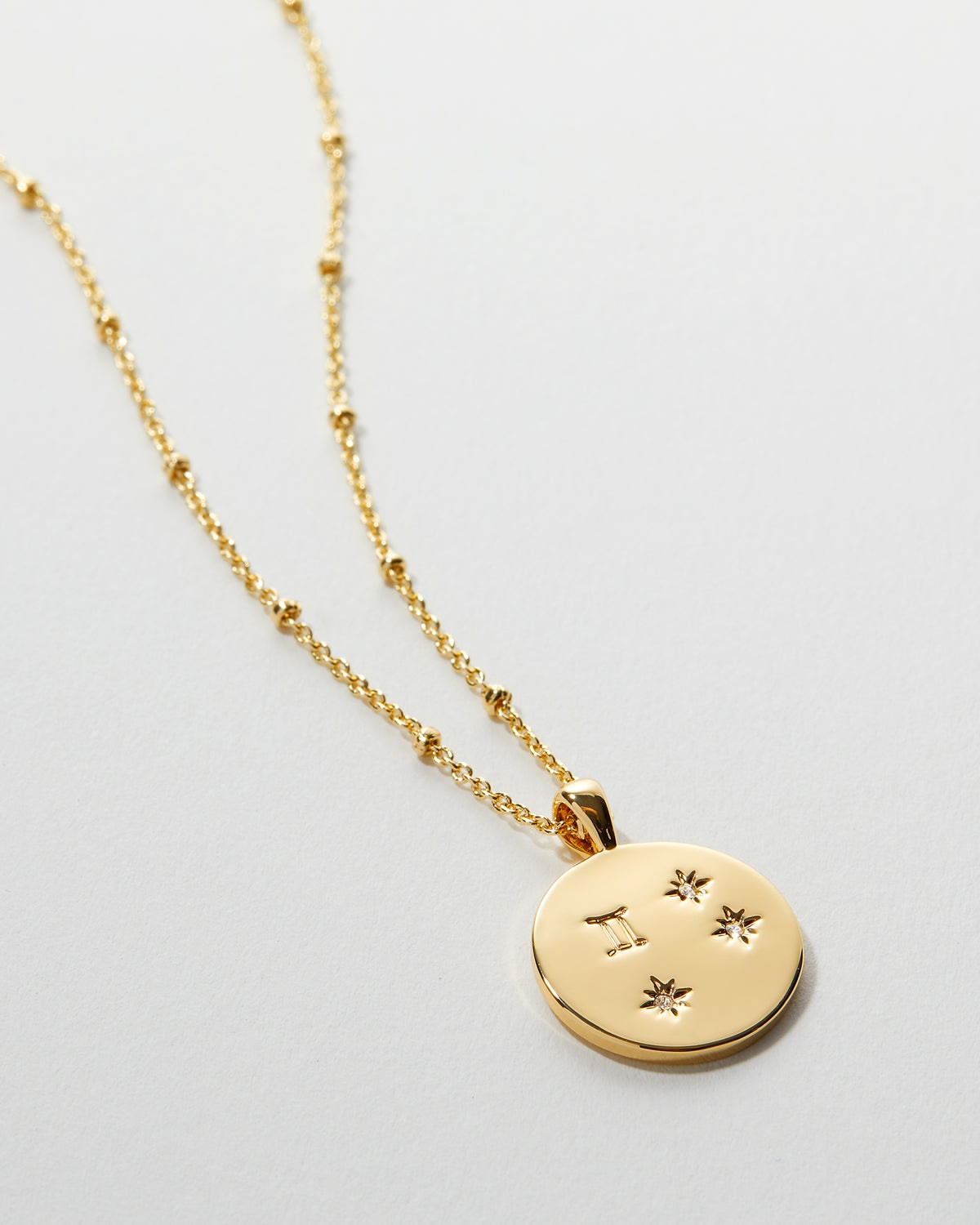 Bryan Anthonys Gold Gemini Zodiac Necklace Macro