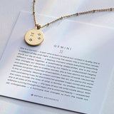 Bryan Anthonys Gold Gemini Zodiac Necklace On Card