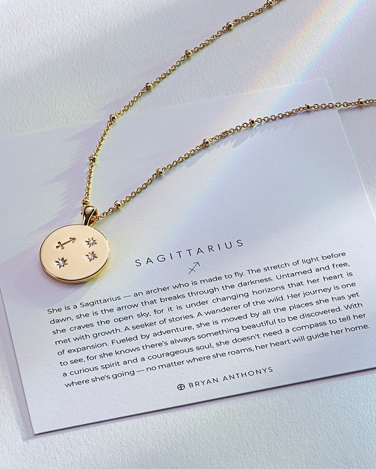 Bryan Anthonys Gold Sagittarius Zodiac Necklace On Card